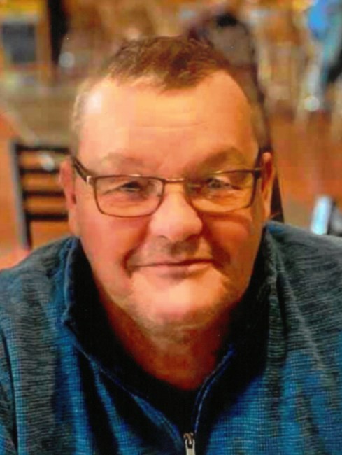 Obituary of George Edward Holmes